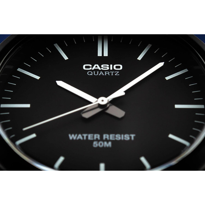 Наручний кварцовий годинник Casio Collection унісекс з полімерним ремінцем, чорно-сріблястий