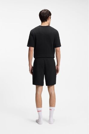 Шкіряний чоловічий ремінь HUGO Geek Sz35 чорного кольору з червоною прошивкою та логотипом на пряжці, розмір XL